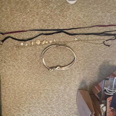 BELTS, BEADED COLLAR AND BARRETTES