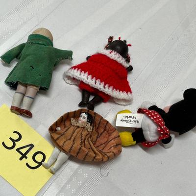 Lot of 4 small dolls