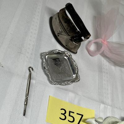 Child's sad iron & cupid