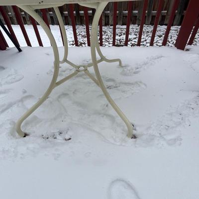 Round glass top patio table