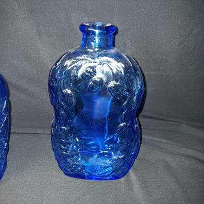 2 BLUE GLASS BOTTLES AND A CANDY DISH