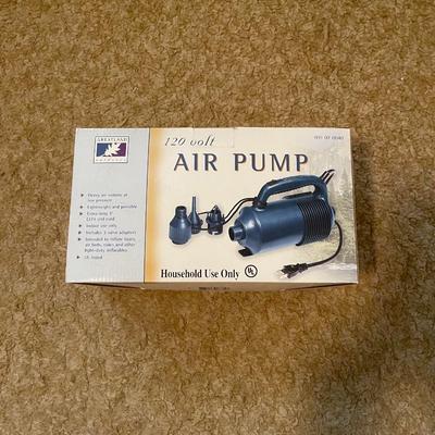 NEW CLOCK RADIO, PORTABLE AM/FM RADIO AND AN AIR PUMP