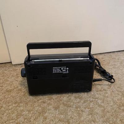 NEW CLOCK RADIO, PORTABLE AM/FM RADIO AND AN AIR PUMP