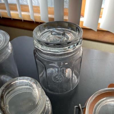 ASSORTMENT OF CANISTERS, BRASS PIECES AND A SEA SHELL 10 PIECE BAND