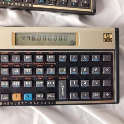 2 hp 12c calculators with cases