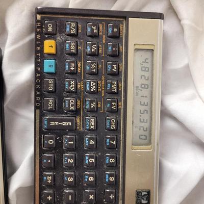 2 hp 12c calculators with cases