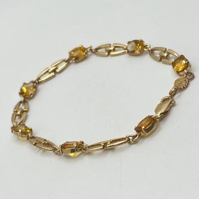 LOT 82J: 14K Yellow Gold and Oval Citrine Bracelet