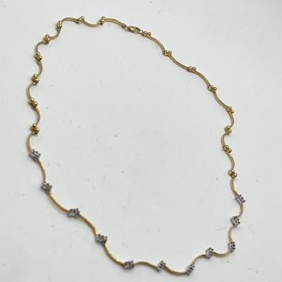 LOT 89J: 10.8 grams 14K Yellow Gold and Diamond Wave Line Bar Tennis Necklace 17.5