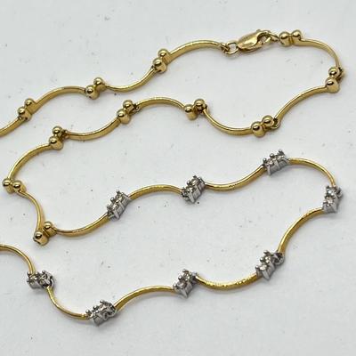 LOT 89J: 10.8 grams 14K Yellow Gold and Diamond Wave Line Bar Tennis Necklace 17.5