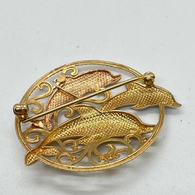LOT 98J: Michael Anthony's Vintage 14K Tri-Color Yellow, Rose and White Gold Circular Filigree Three Dolphin Brooch - 4.5 grams
