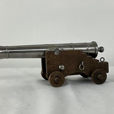 1030 Vintage Striking Cannon on Wood