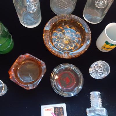 LARGE AMOUNT OF BAR GLASSES, ASHTRAYS AND CARAFES