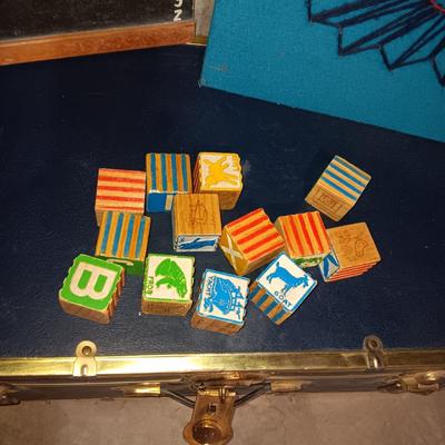 METAL TRUNK, CHALK BOARD, WOODEN BLOCKS AND YARN CLOWN ART