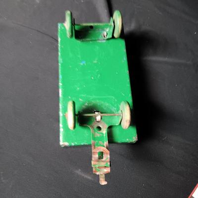 MARX TOY HAY HAULER AND A TIN SIGN