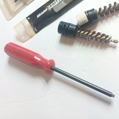 Universal gun cleaning rod with cleaning patches and bore tools