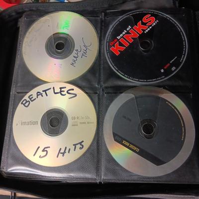 LARGE 3 RING CASE FULL OF A VARIETY OF MUSIC ON DISC
