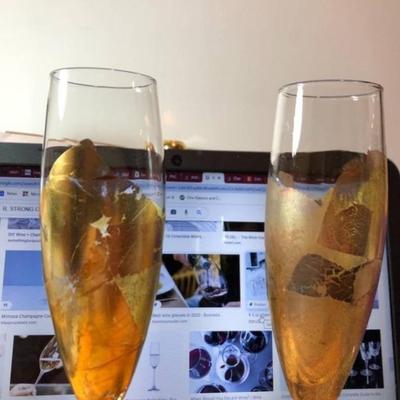 2-(RANDY STRONG) HAND SIGNED CHAMPAGNE GLASSES 10" TALL PREOWNED FROM AN ESTATE IN VG CONDITION AS PICTURED.