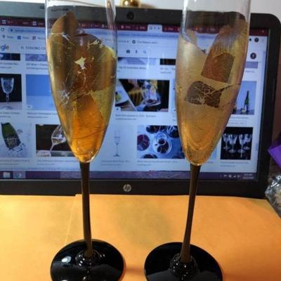 2-(RANDY STRONG) HAND SIGNED CHAMPAGNE GLASSES 10" TALL PREOWNED FROM AN ESTATE IN VG CONDITION AS PICTURED.