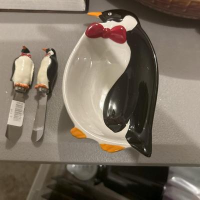 Penguin dish with serving utensils