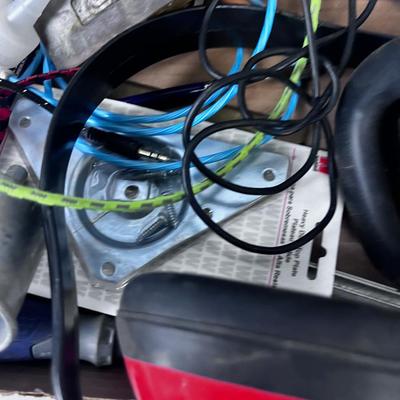 Tray of Garage Stuff; Chain Saw Bar, Cables, Hearing Protection.