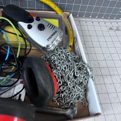 Tray of Garage Stuff; Chain Saw Bar, Cables, Hearing Protection.