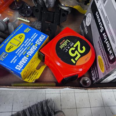 Tray of Garage Stuff:  Tape Measure, Screws, Wire Brush