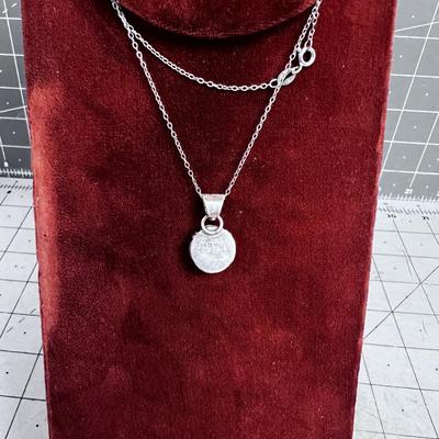 NEAT Looks like the MOON - Opal Pendant on Sterling Siler Chair