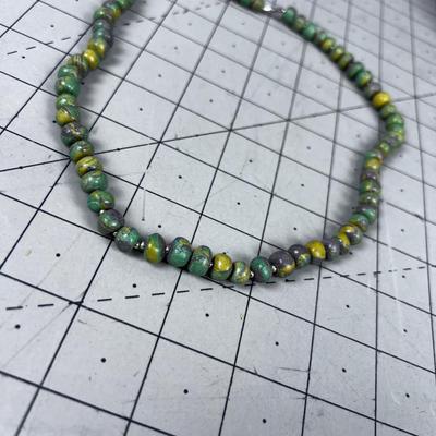 Purple, Green, Gold Toned Stone or Hand rolled Clay turned into a bead? Necklace