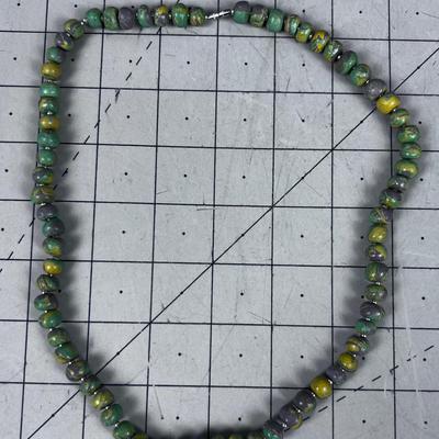 Purple, Green, Gold Toned Stone or Hand rolled Clay turned into a bead? Necklace
