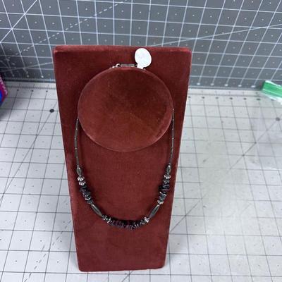 Liquid Silver with Tiger Eye and other Beads. 