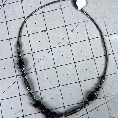 Liquid Silver with Tiger Eye and other Beads. 