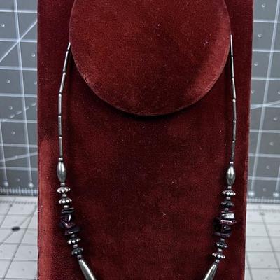 Liquid Silver with Tiger Eye and other Beads. 