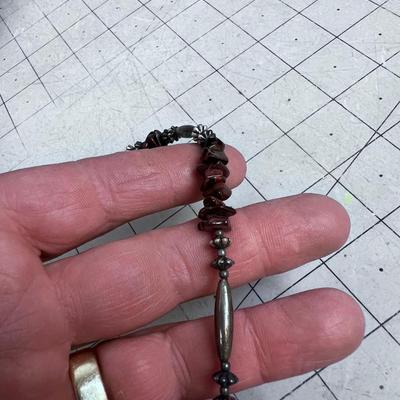 Liquid Silver with Tiger Eye and other Beads. 