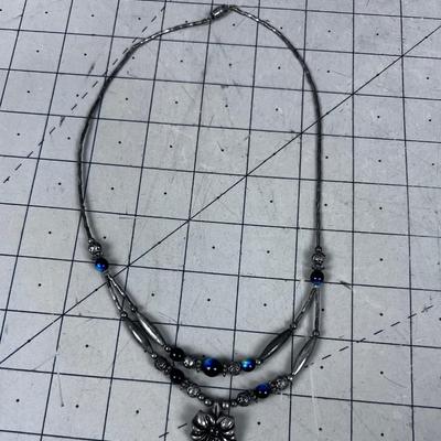Liquid Silver with Blue Iridescent  and other Beads. 