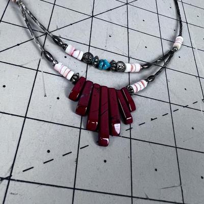 Liquid Silver with Red Jasper Stones plus other Beads. 