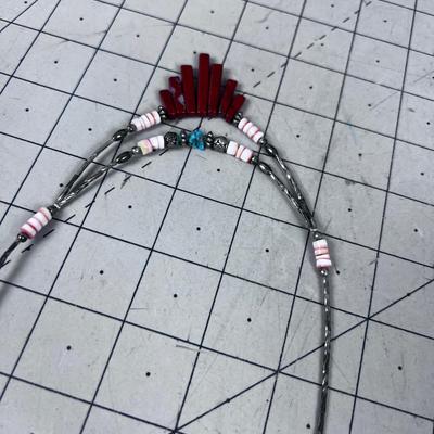 Liquid Silver with Red Jasper Stones plus other Beads. 