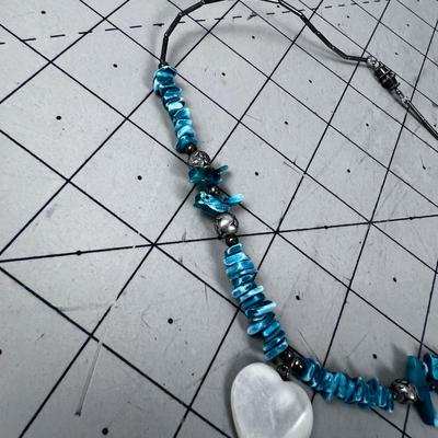 Liquid Silver with Turquoise Carved Birds and a White Heart