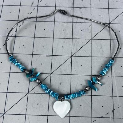 Liquid Silver with Turquoise Carved Birds and a White Heart