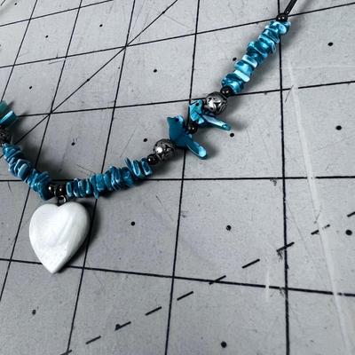 Liquid Silver with Turquoise Carved Birds and a White Heart