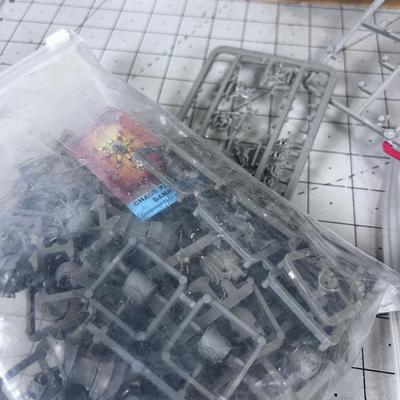 A WHOLE Box of WAR HAMMER, Many figures still on the Spur; weapons etc. 