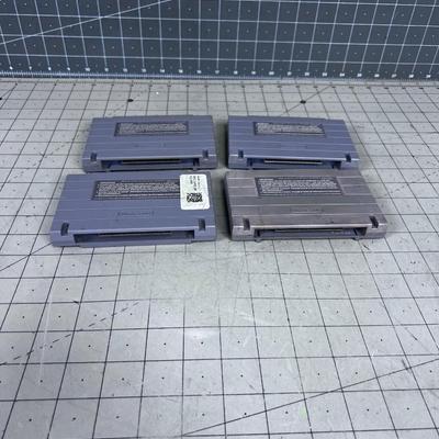 (4) Super Nintendo Cartridges Mostly Mario's