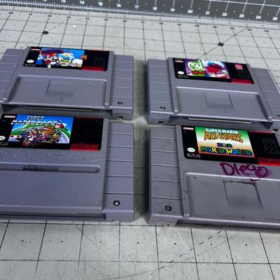 (4) Super Nintendo Cartridges Mostly Mario's