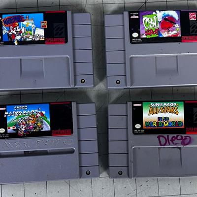 (4) Super Nintendo Cartridges Mostly Mario's
