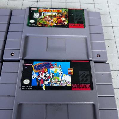 (4) Super Nintendo Cartridges Mostly Donkey Kong and Ms. Pacman