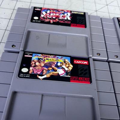 (4) Super Nintendo Cartridges Street Fighter and Space Invaders
