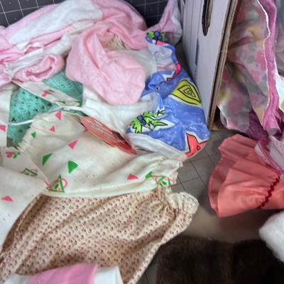 Box Full of Doll Clothes 