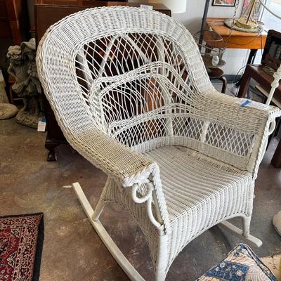 White Wicker Chair with Pillows and Love sign