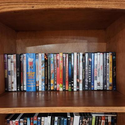 4 Shelves full of DVD's Some still sealed