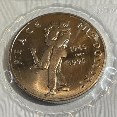 Marshall Islands Uncirculated Condition VJ-Day WWII Commemorative "The Iconic Kiss" Coin as Pictured.