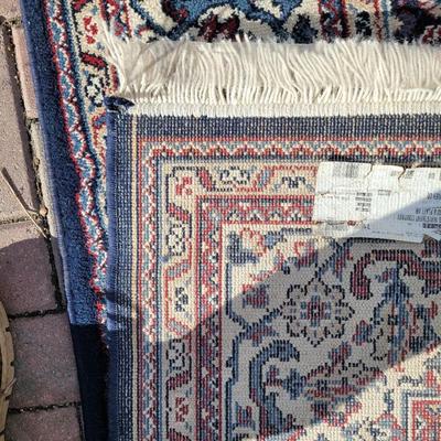 2 Persian styled rugs 1 large 1 smaller